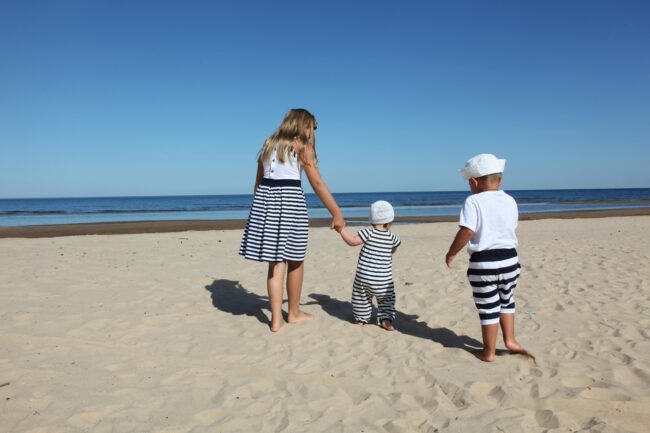 a family on vacation at a beach