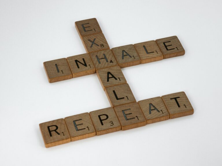 Scrabble pieces that say inhale, exhale and repeat.