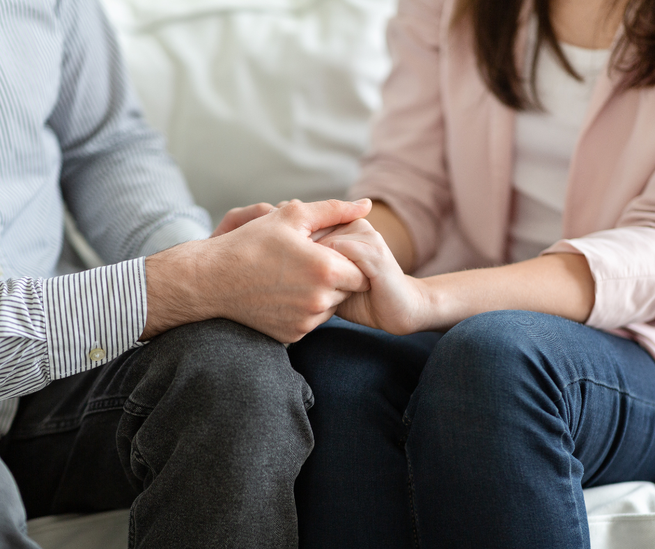 A picture of a couple holding hands while attending couples therapy in Fort Worth.